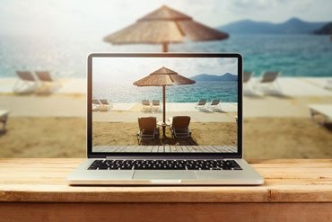 Fototapete Beispiel Laptop mit Strand